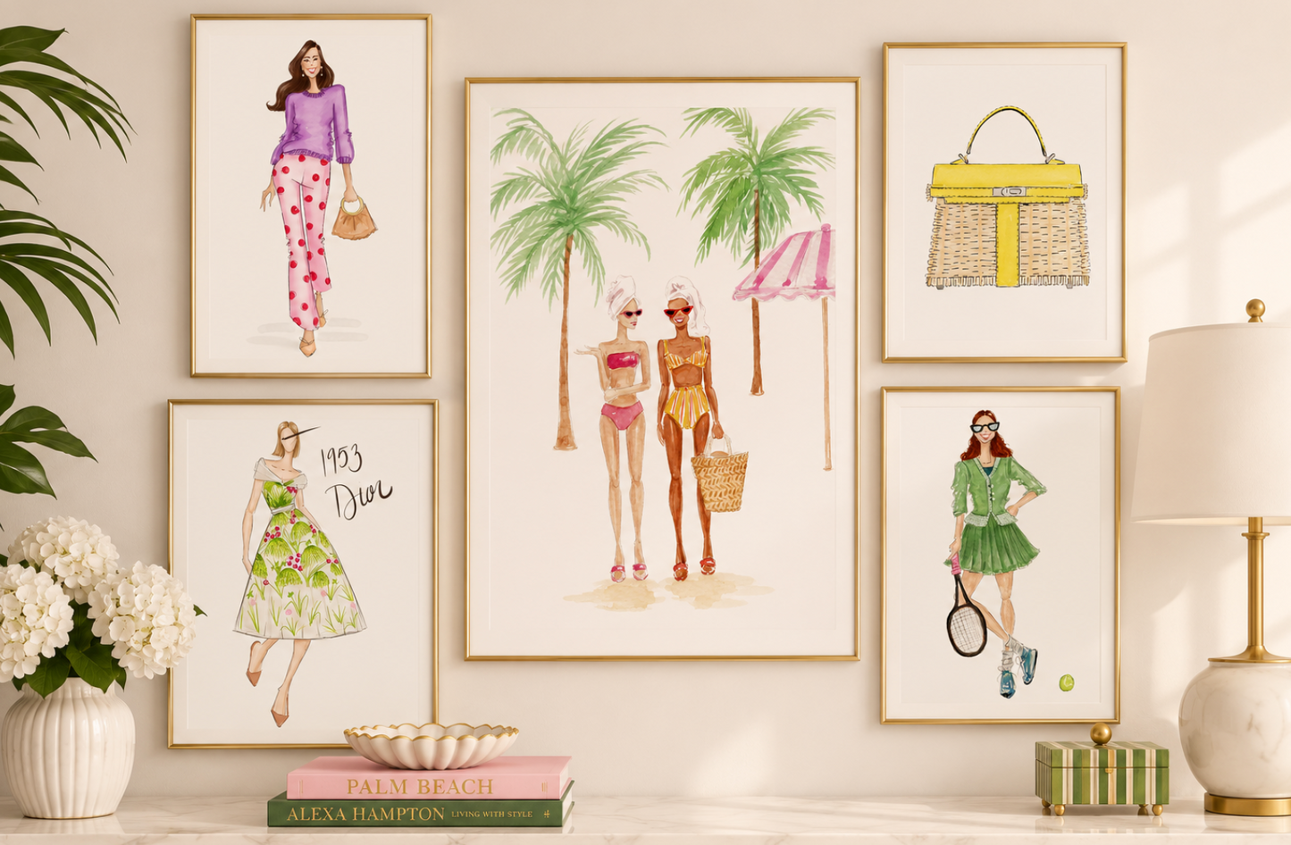 A styled interior scene showing five framed fashion-themed art prints arranged on a wall above a console table. The prints feature watercolor illustrations of women in summer outfits, palm trees, a yellow woven handbag, a green tennis dress, and a vintage Dior gown. Illustrated by Lamar Osborne Design
