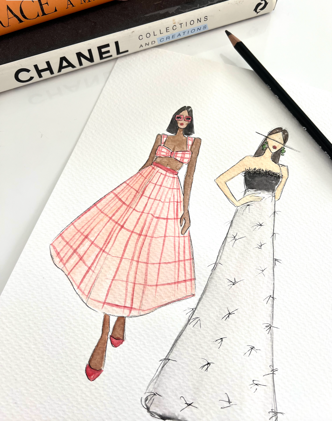 Studio photo of watercolor fashion illustration process