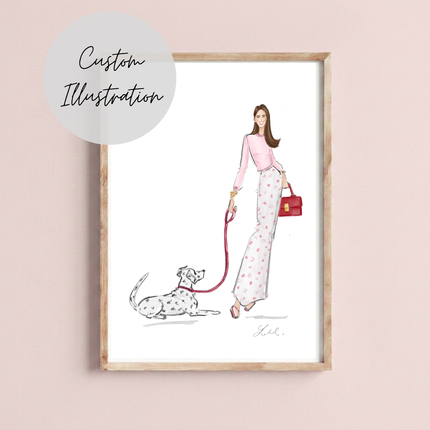 A framed fashion illustration print showing a woman in a pink top and white polka-dot pants walking a Dalmatian dog, with a red handbag and a light wood frame. A light gray circular badge in the top left reads 'Custom Illustration' on a soft blush pink background.